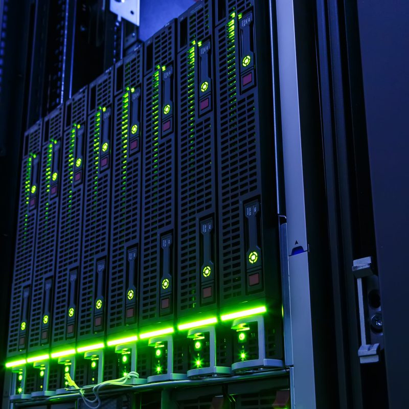 53405632 rack with blade behind bars mainframe in the data center